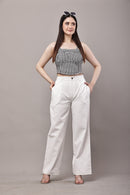 Black and white gingham co-ord set for women styled look with bustier crop top and white wide leg trousers