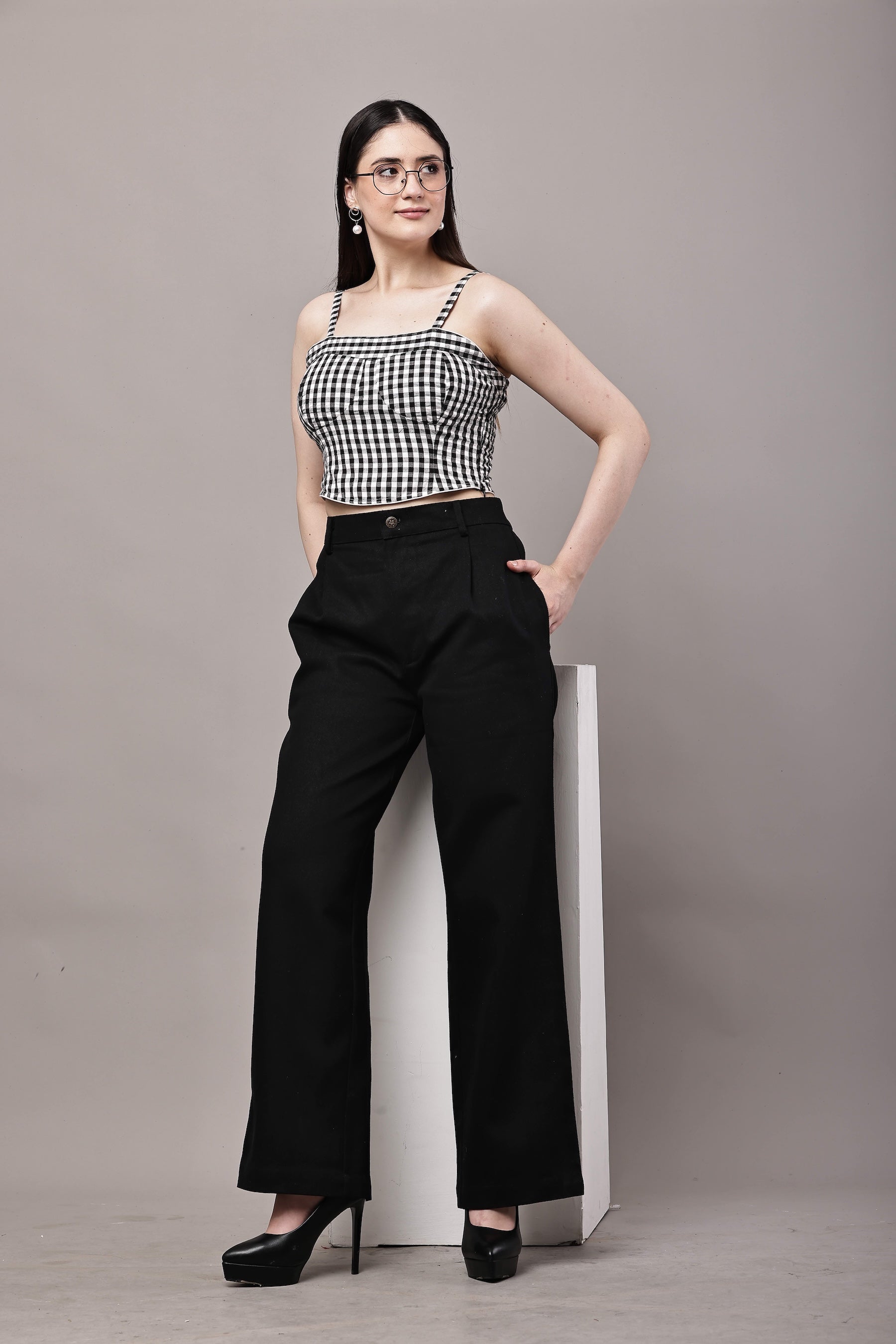 Black and white gingham co-ord set for women styled look with bustier crop top and high waist wide leg trousers