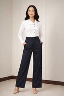 Ameera navy blue high-rise parallel cotton satin trousers for women styled with a white shirt