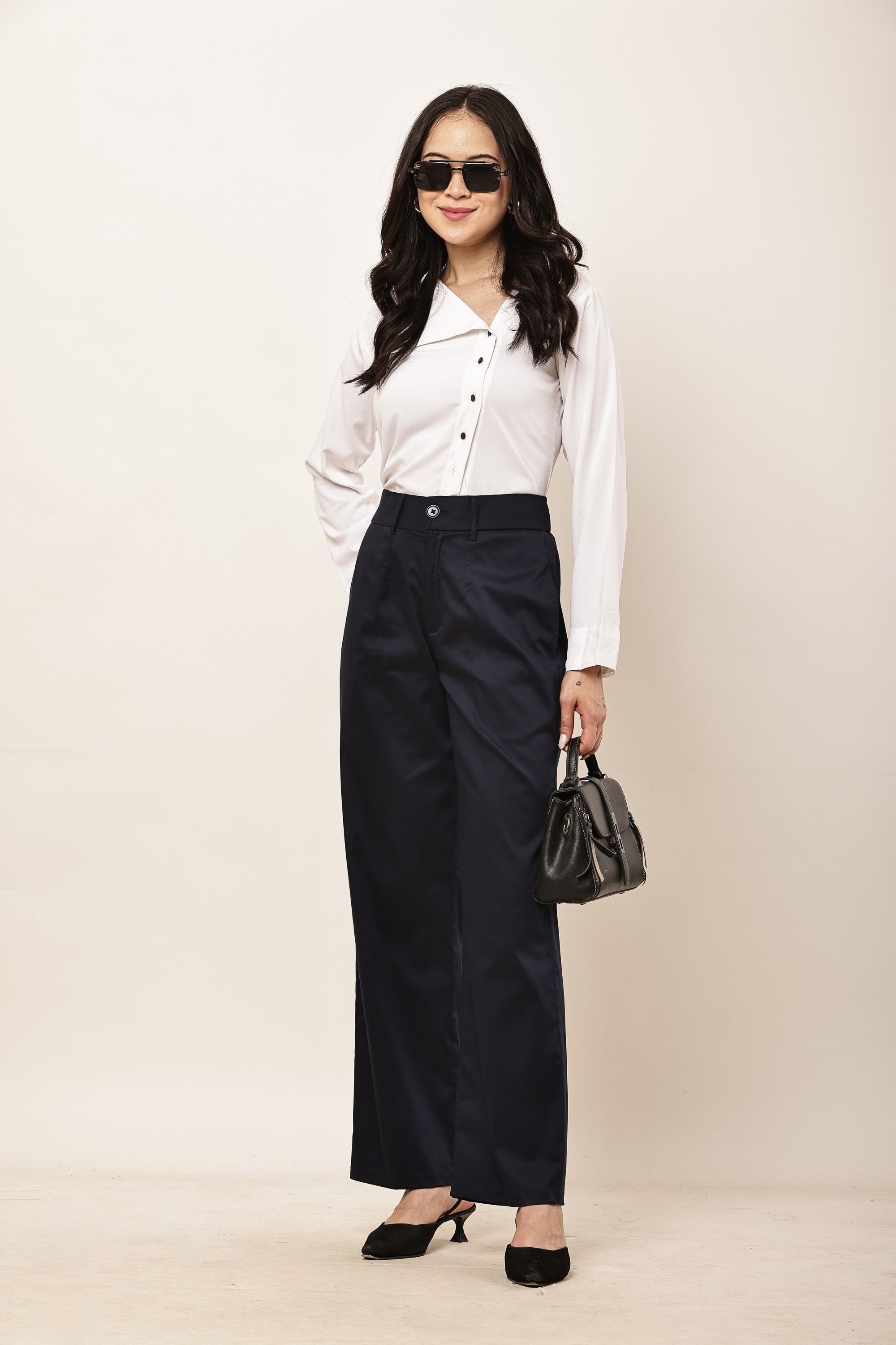 Ameera navy blue high-rise parallel cotton satin trousers for women styled with a white shirt